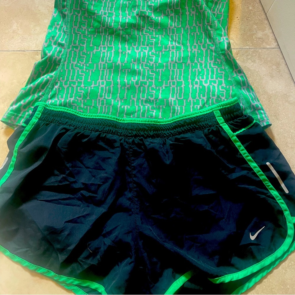 Nike set; can sell as separates. shirt is size M w built-in bra. Shorts size L